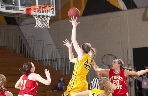 Basketball player taking a shot.