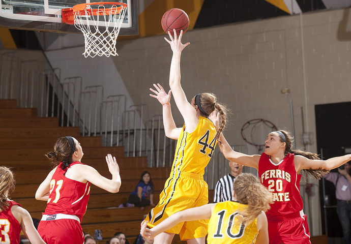 Basketball player taking a shot.