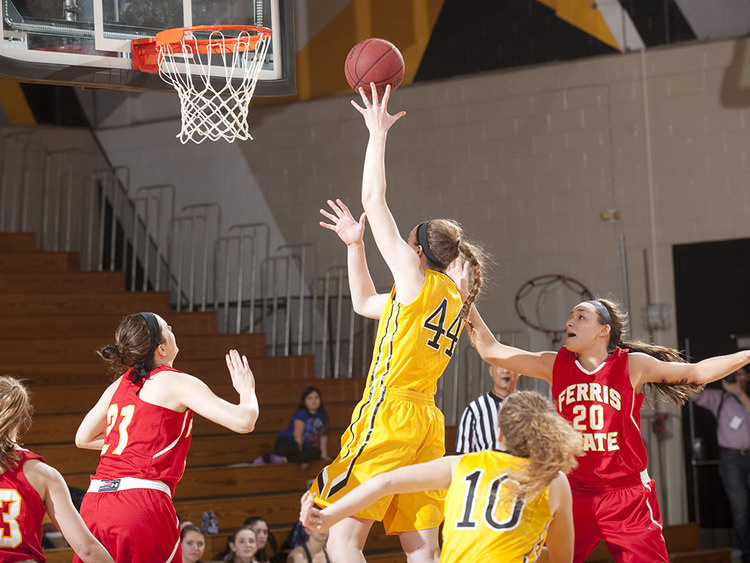 Basketball player taking a shot.